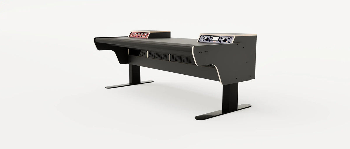 Wide angle view of the Binary premium studio desk for with padded arm rest and 2x 2 rack units on the desktop. Integrated cable management and powder coated steel legs. Black with expressed plywood edge.