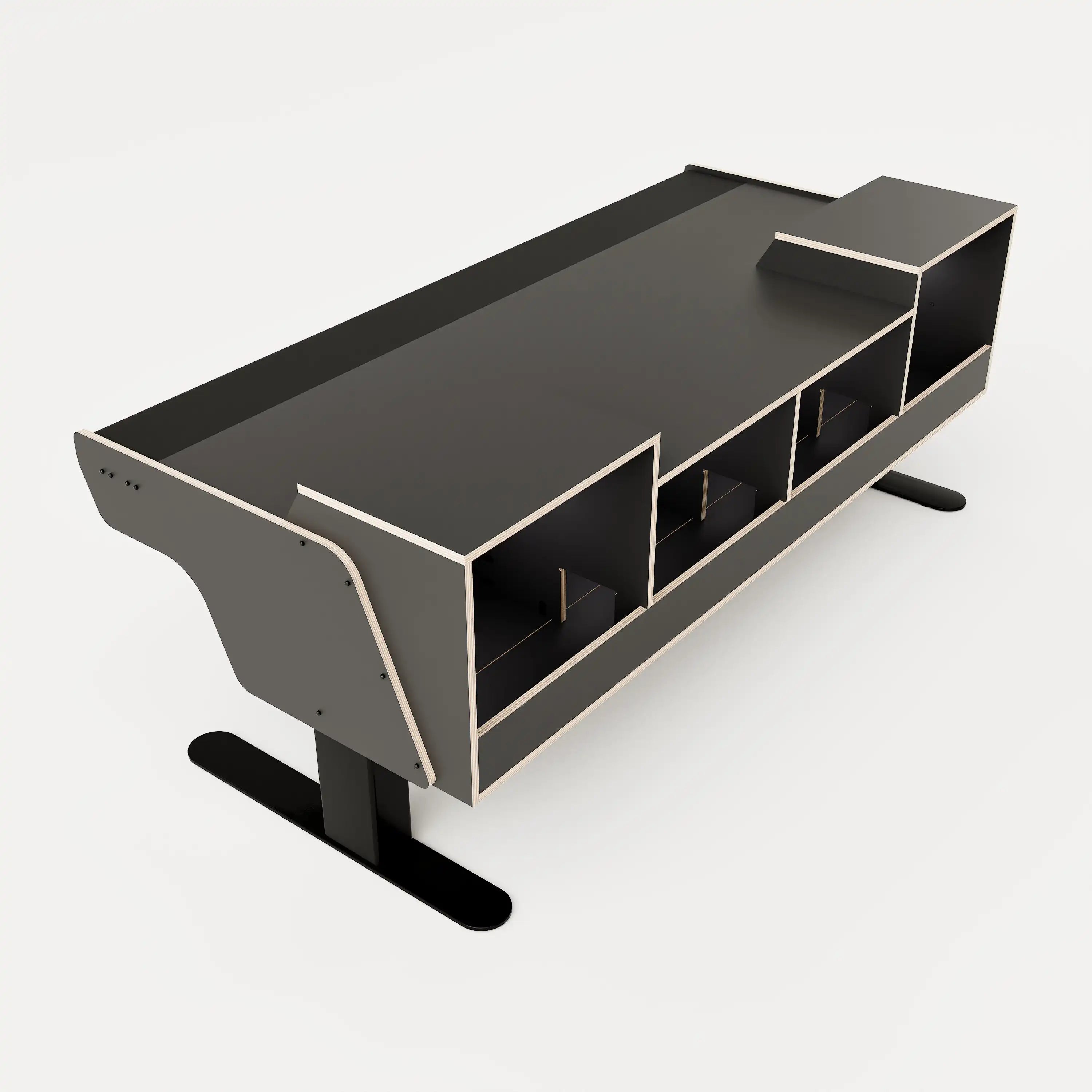 Rear side view of the Binary premium studio desk with padded arm rest and 2x 2 rack units on the desktop. Integrated cable management and powder coated steel legs. Black with expressed plywood edge.