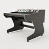 Right side view of the Callisto 222 studio desk with padded arm rest and 2x 2 rack units on the desktop. Integrated cable management. Black with expressed plywood edge.