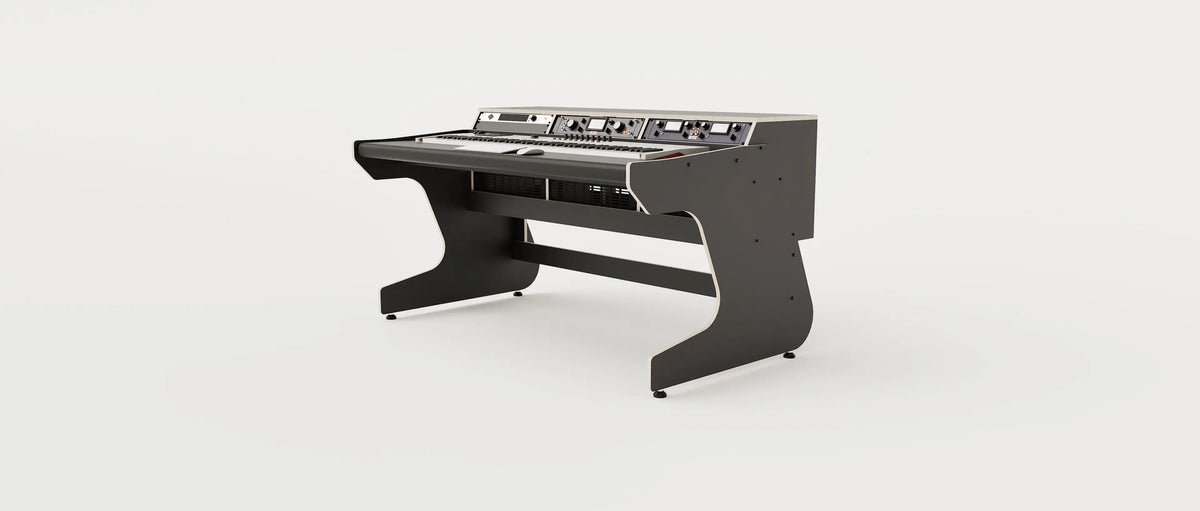 Wide angle view of the Callisto 1922 studio desk for keyboards with padded arm rest and 2x 2 rack units on the desktop. Integrated cable management. Black with expressed  plywood edge.