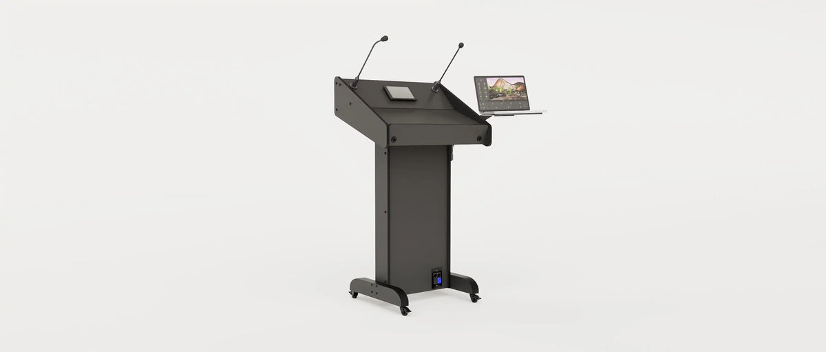 Wide angle right view of Lectern 1. Showing gooseneck mics, touch screen controller, laptop arm and tray, lower audio visual connection plate. Black edge banded finish.